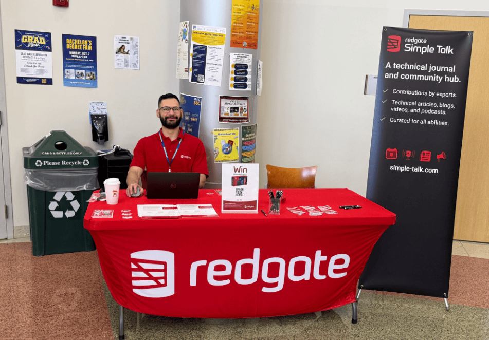 A person sitting at a table with a red cloth Description automatically generated