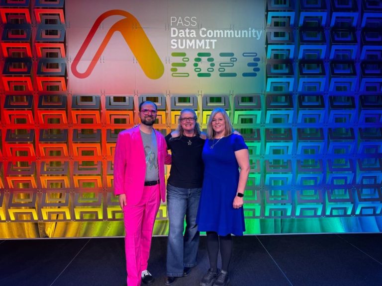Three PASS Summit 2023 attendees on-stage.